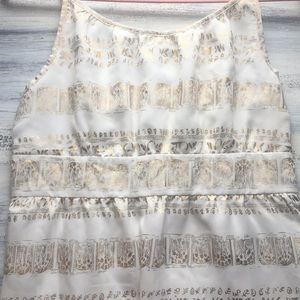 Dress with white with gold details.